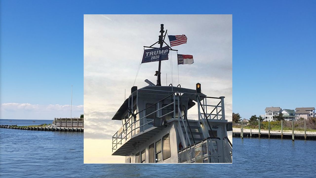 2 ferry workers suspended for week for pro-Trump flag