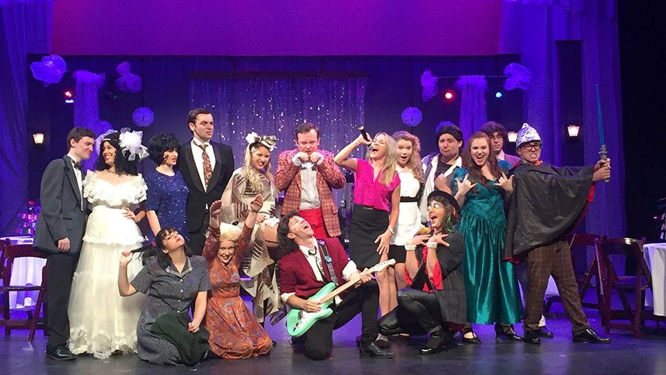 The cast of "The Wedding Singer" pose with Entertainment reporter Allison Walker Torres. The musical is now at the Athens Theatre in DeLand. (Allison Walker Torres, staff)