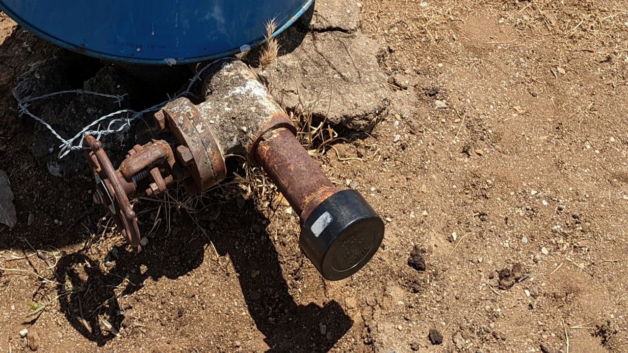 This photo provided by Clark Williams-Derry, shows a well leaking methane on May 10, 2022, in a neighborhood on the outskirts of Bakersfield, Calif. (Clark Williams-Derry via AP)