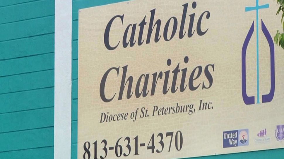 Sign over Catholic Charities entrance