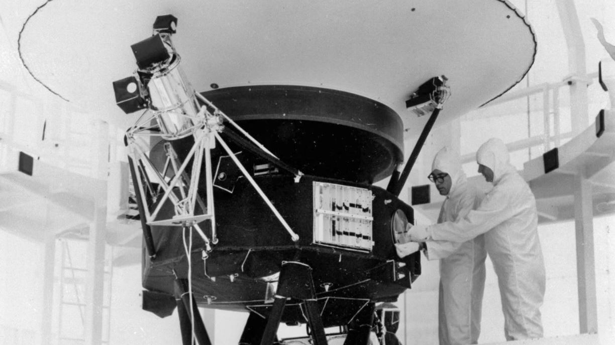 In this Aug. 4, 1977, photo provided by NASA, the “Sounds of Earth” record is mounted on the Voyager 2 spacecraft in the Safe-1 Building at the Kennedy Space Center, Fla., prior to encapsulation in the protective shroud. After days of silence, NASA has heard from Voyager 2, more than 12 billion miles away in interstellar space. Flight controllers accidentally sent a wrong command nearly two weeks ago that tilted the spacecraft’s antenna away from Earth and severed contact. The project manager said Tuesday, Aug. 1, 2023 that the fact that the Deep Space Network has picked up a “heartbeat signal” means the 46-year-old craft is alive and operating. (AP Photo/NASA, File)