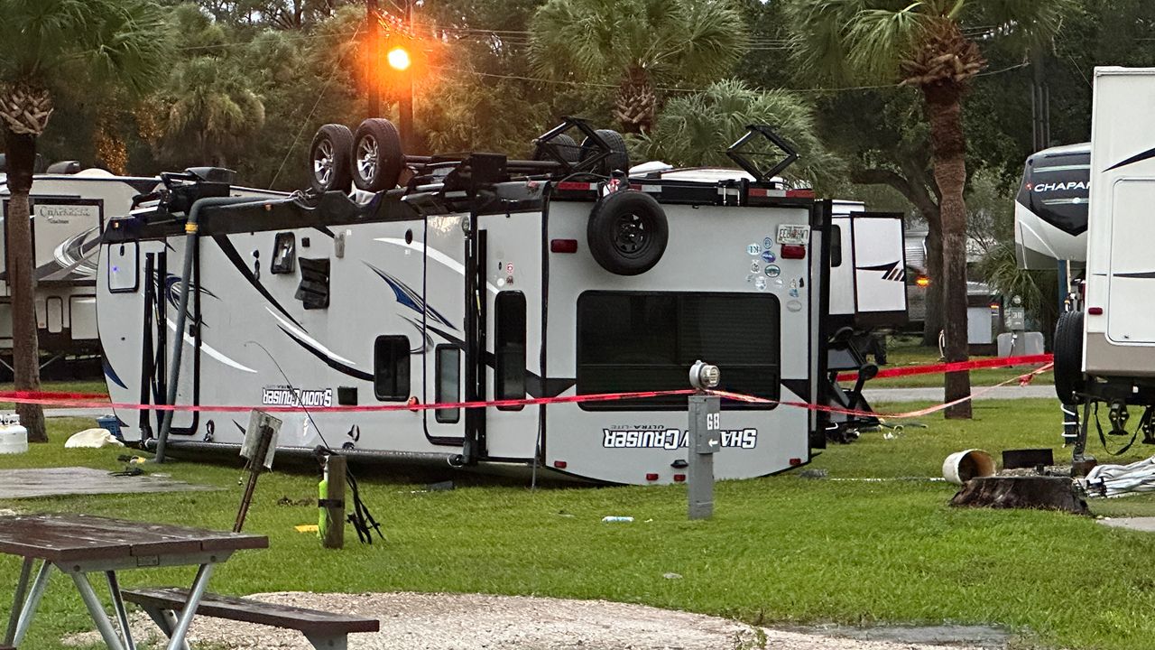 A camper was flipped over in Sonrise Palms RV Park in Brevard County's Space Coast. (Spectrum News 13/Destiny Wiggins)