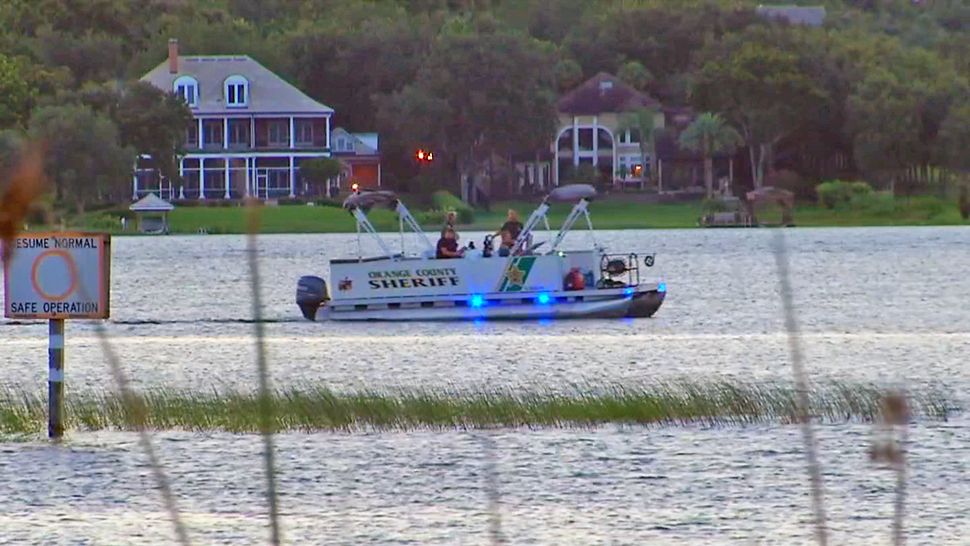 Authorities search for a missing swimmer in Lake Down on Sunday evening. (Spectrum News 13)