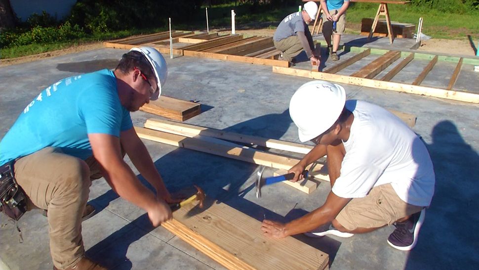Students who are part of the inaugural senior class of the Youth Construction Academy, a new program Habitat for Humanity of Lake-Sumter, are learning how to build homes. (Sarah Panko, staff)