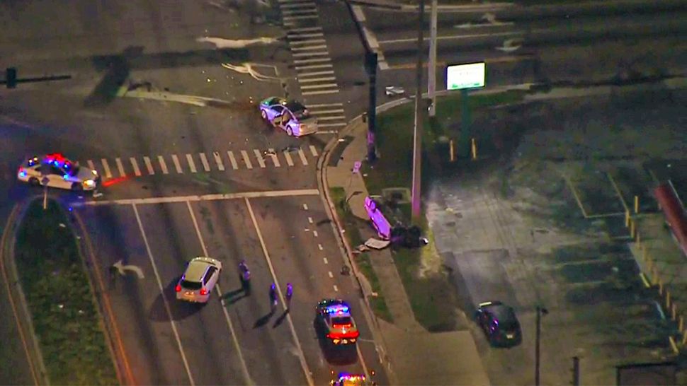 Orange County Sheriff's Office stated that one of those cars was stolen and was fleeing deputies when it crashed into the other vehicle on Powers Drive in Orlando on Friday, Aug. 24, 2018. (Sky 13)