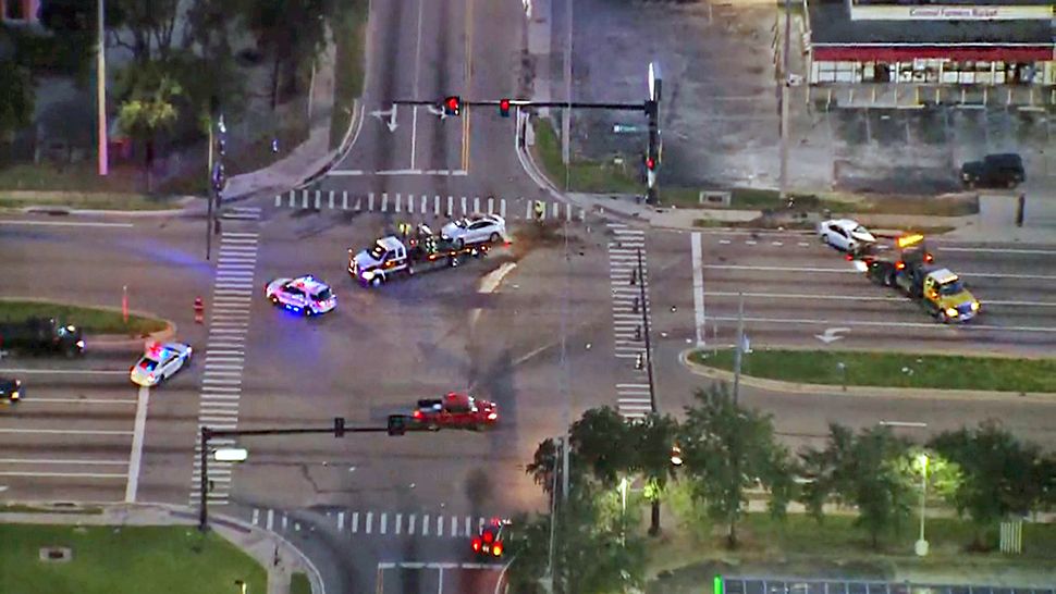 Orange County Sheriff's Office stated that one of those cars was stolen and was fleeing deputies when it crashed into the other vehicle on Powers Drive in Orlando on Friday, Aug. 24, 2018. (Sky 13)