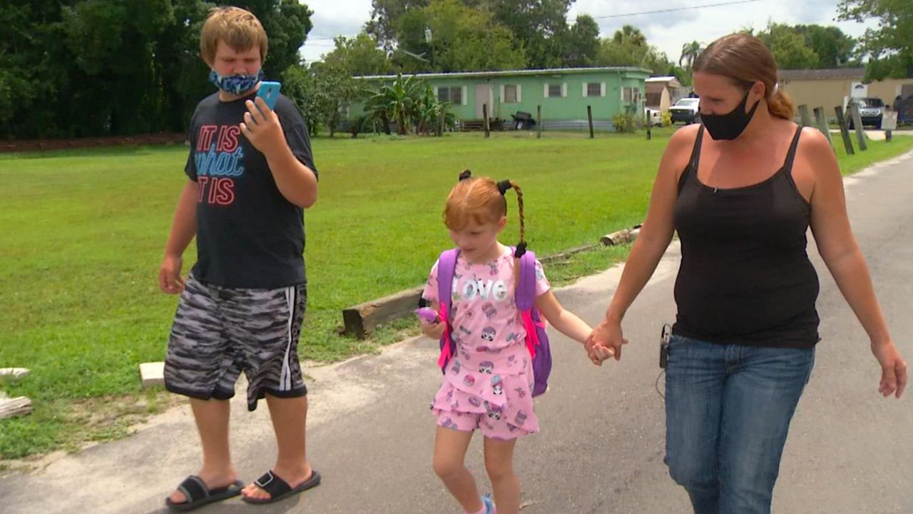 Little 6-year-old Kalia Ganiel is heading to first grade this year and like the many students heading back to class, she is taking the bus, and it is the first time for her. (Spectrum News 13)