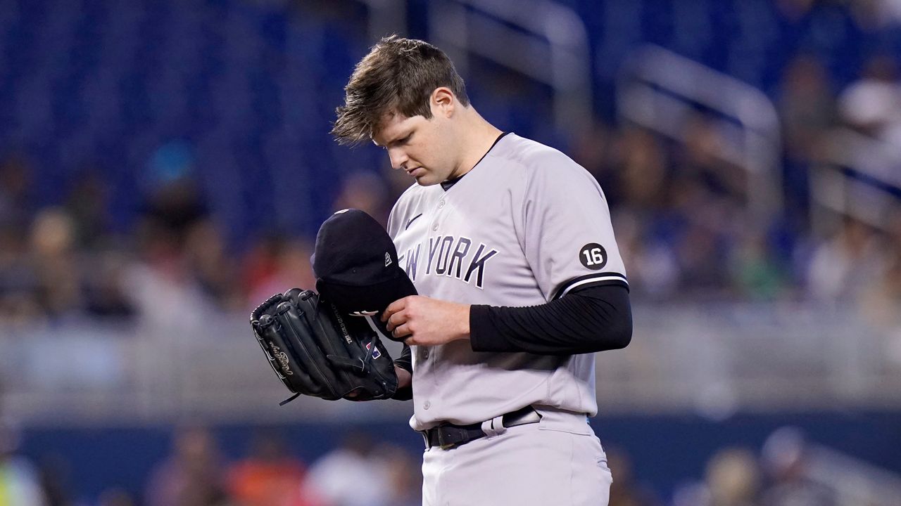 An Aug. 1, 2021, file photo of New York Yankees starting pitcher Jordan Montgomery during the first inning of a baseball game against the Marlins in Miami