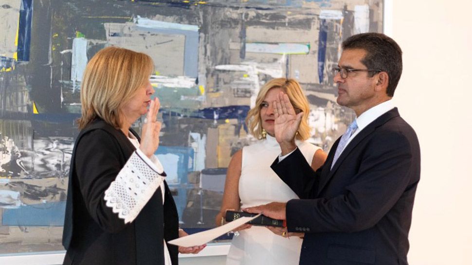 Pedro R. Pierluisi, right, being sworn in as Puerto Rico's new governor. (Courtesy of Puerto Rico Governor's Office/Facebook)