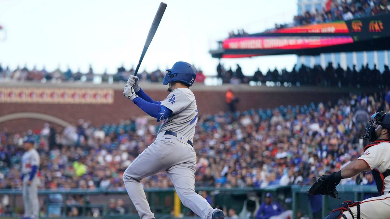 Los Angeles Dodgers designated hitter Miguel Vargas watches his RBI double against the Giants during the second inning of a baseball game in San Francisco on Wednesday. (AP Photo/Jeff Chiu)