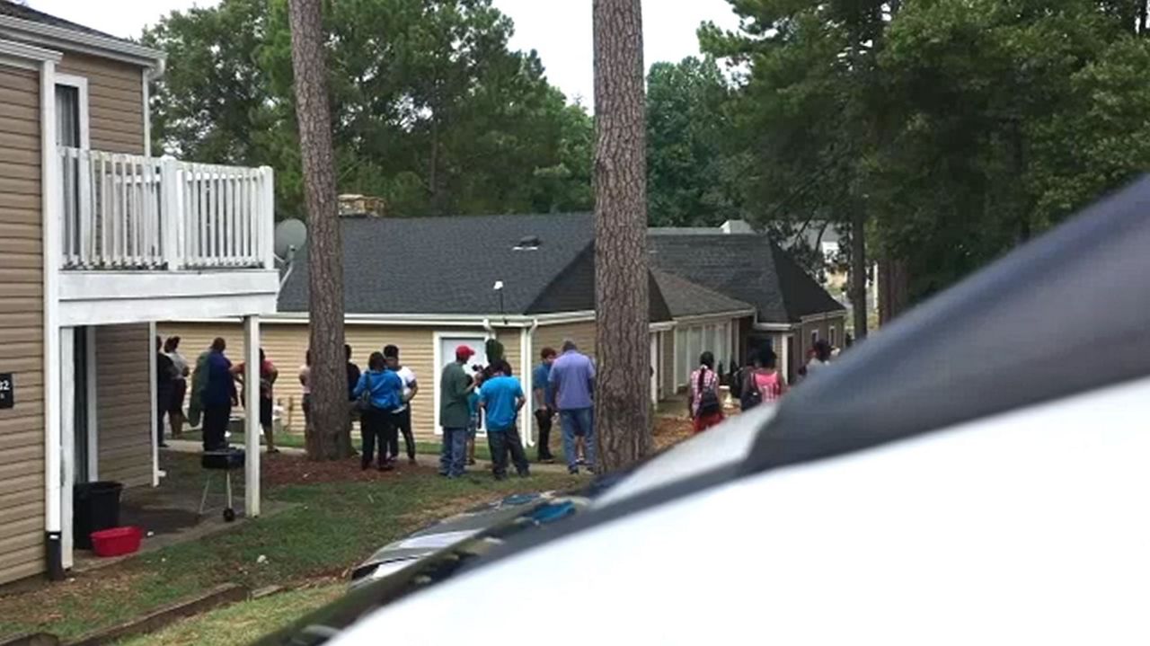 residents outside the complex