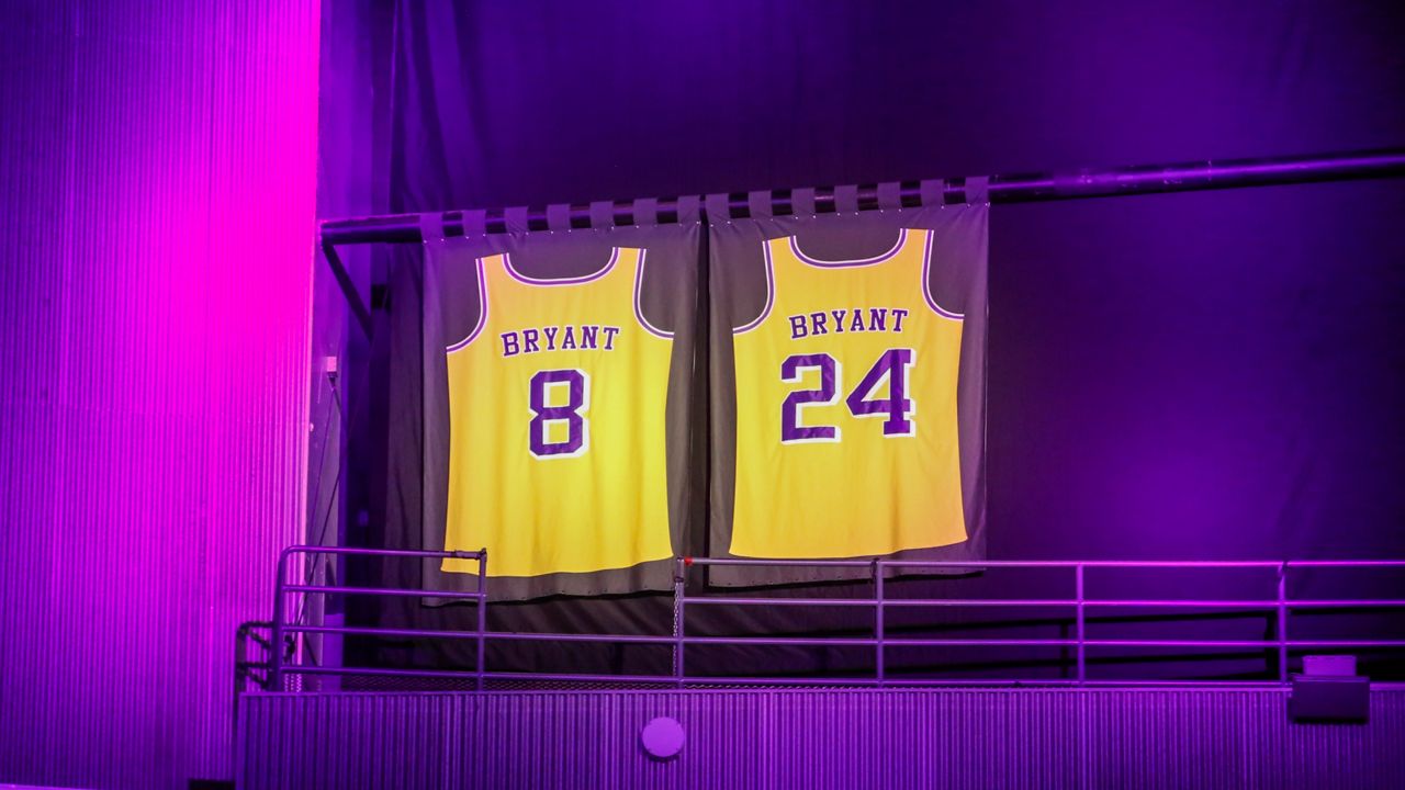 The retired jerseys of late Los Angeles Lakers legend Kobe Bryant (AP Photo/Ringo H.W. Chiu)