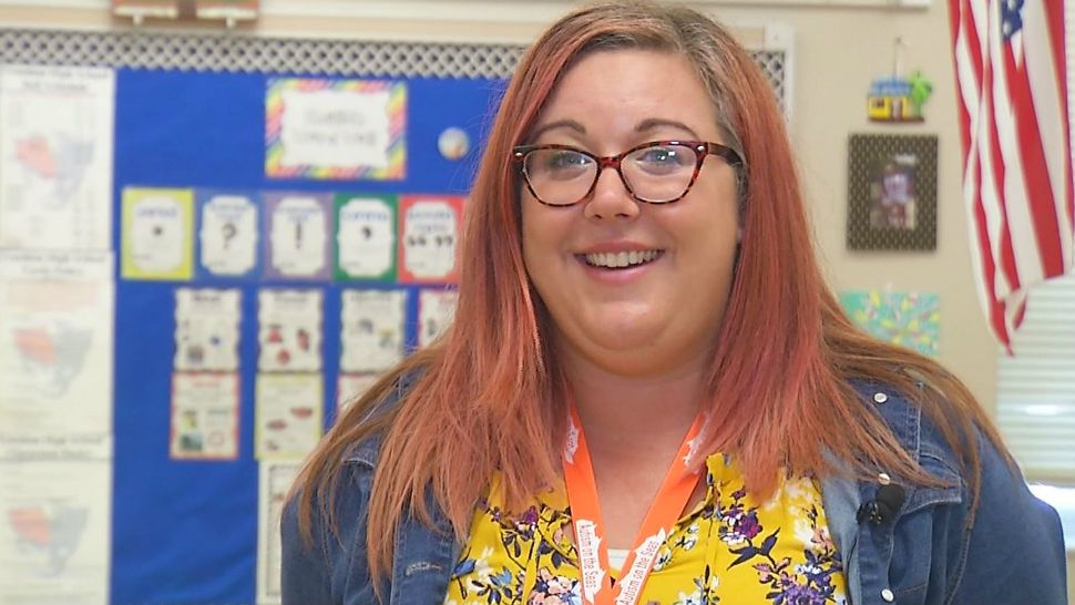 One-on-one attention is a top priority in Amy Swederski's U.S. government class at Freedom High in Orlando. (Tammie Fields/Spectrum News 13)