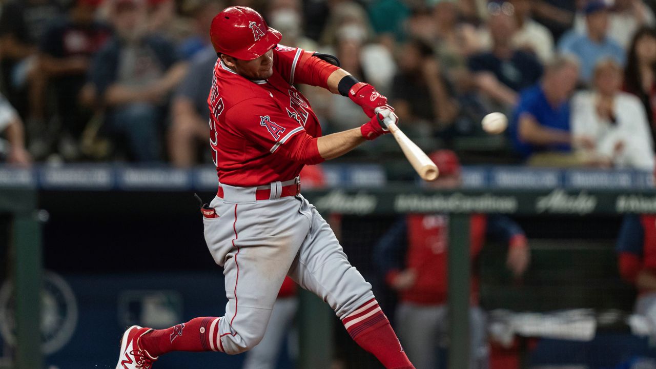 Los Angeles Angels' David Fletcher hits a two-run home run off Seattle Mariners starting pitcher Chris Flexen during the sixth inning of the second game of a baseball doubleheader, Saturday, Aug. 6, 2022, in Seattle. (AP Photo/Stephen Brashear)