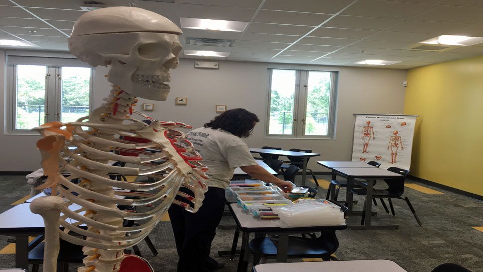 Nursing Instructor, Mrs. Kristine Petrulis prepares her classroom at Pinellas Technical High School at Seminole. (Melissa Eichman)