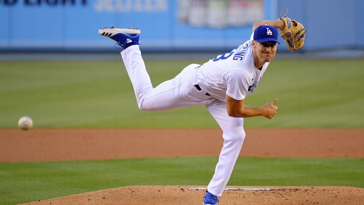 Los Angeles Dodgers' Austin Barnes lays down a RBI bunt against