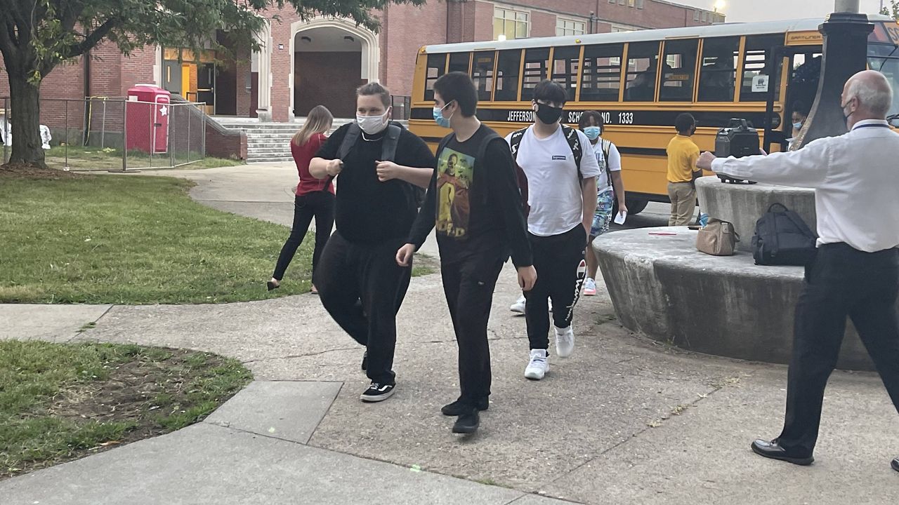 Students arrive for the first day of classes at the Academy at Shawnee in Louisville on Aug. 11, 2021. (Spectrum News 1/Amber Smith)