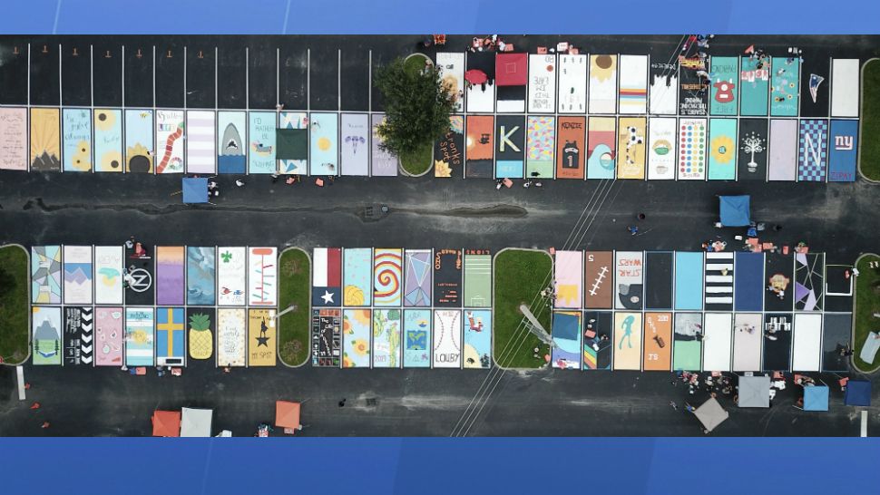 As seen from above, Oviedo High School seniors got to paint their parking spaces Saturday to raise money for their class. (Courtesy of Tracy Pierce)