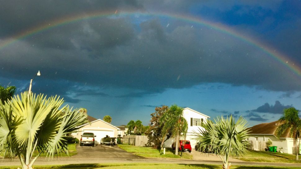 Sent to us via the Spectrum News 13 app: A full rainbow brightens dark skies over Merritt Island on Saturday afternoon. (Jason Robertson, viewer)