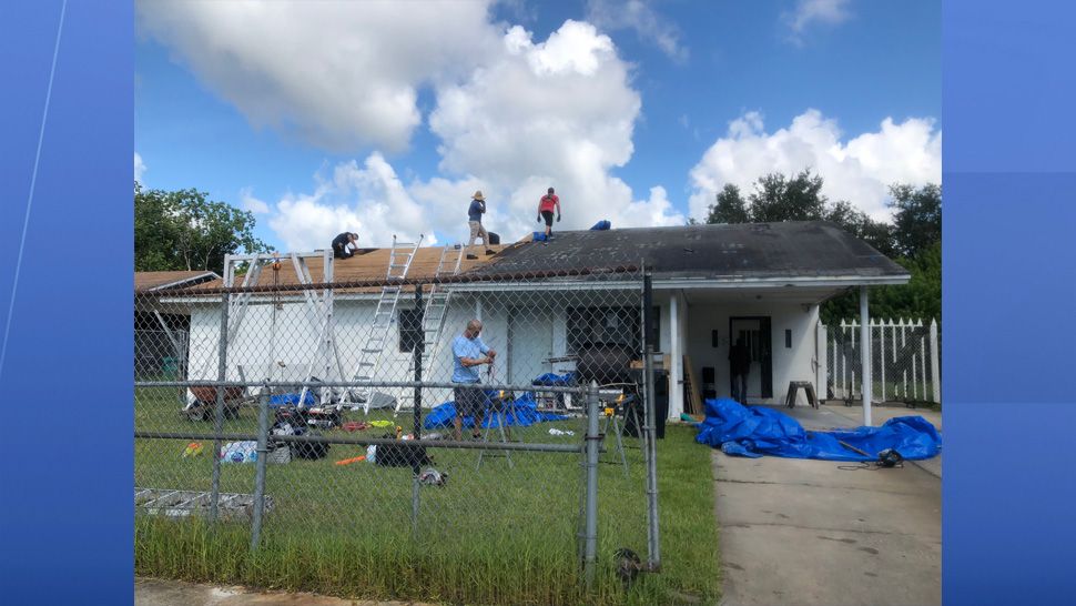 Orlando firefighters spent their Sunday helping an elderly couple fix their home with a leaky roof. (Orlando Fire Department)