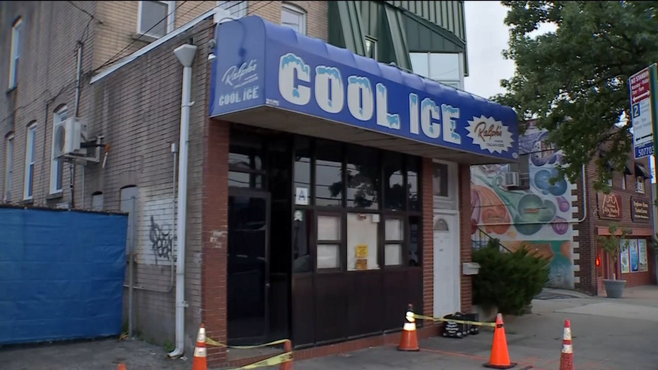 Scooping Ralph's ice at a place in Castleton Corners called Cool Ice