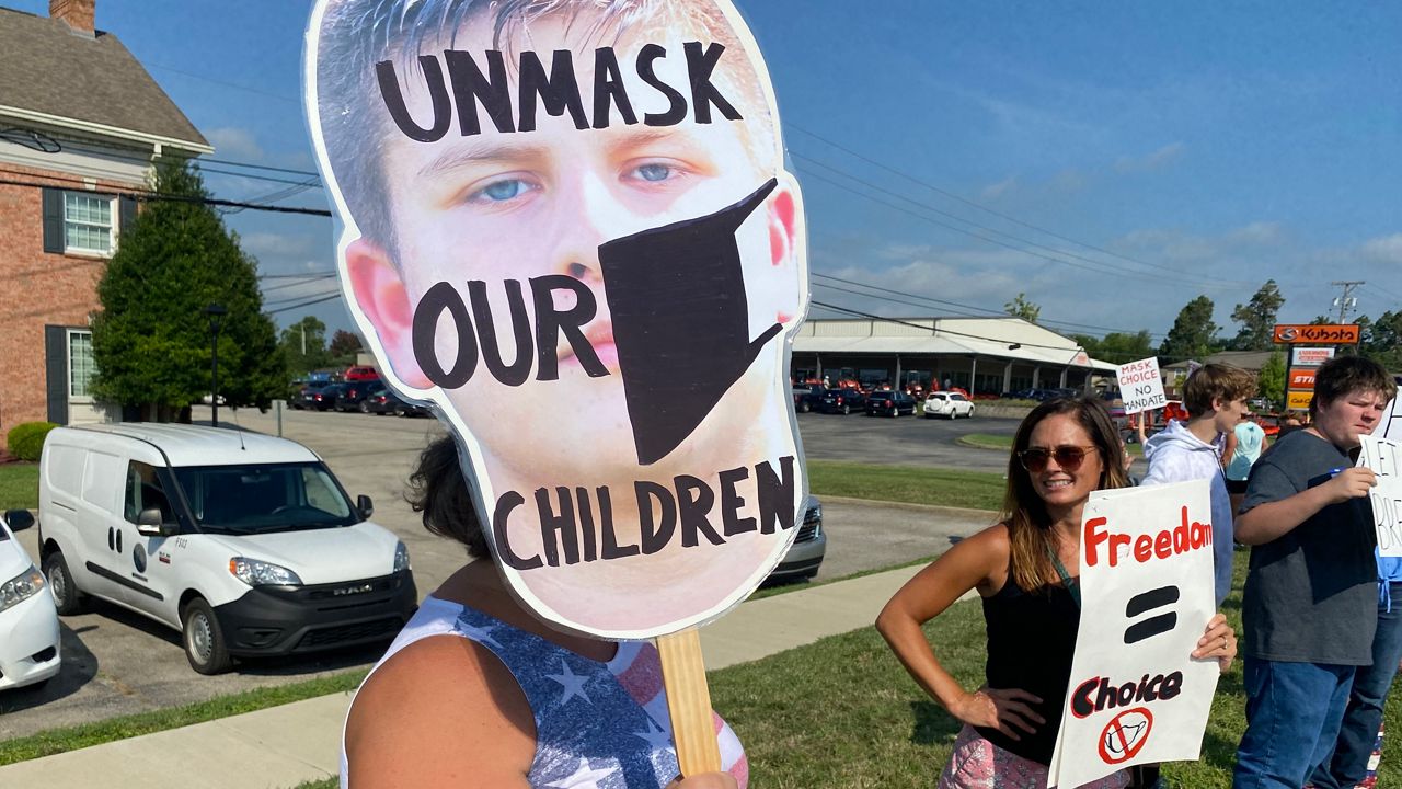 Parents protest mask mandate at Louisville Catholic Schools: 'Fear is a  liar