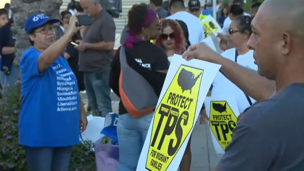 Hundreds marched to the U.S. Court of Appeals on Wednesday, August 14, 2019 the day the court will hear a challenge from Trump on terminating the status of 300,000 immigrants. (Spectrum News)