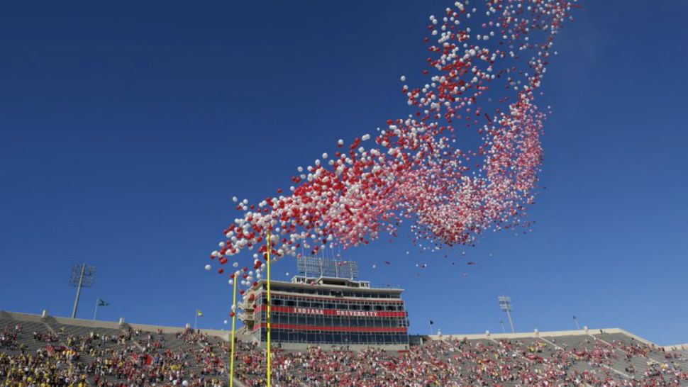 In this Oct. 14, 2017, file photo balloons are released in Memorial Stadium before an NCAA college football game between Indiana and Michigan in Bloomington, Ind. (AP Photo/AJ Mast, File)