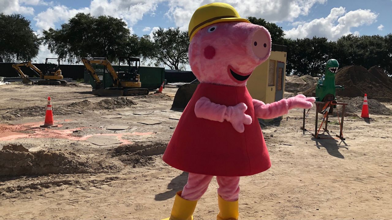 Peppa Pig poses at the construction site of the new Peppa Pig Theme Park which is being built next to Legoland Florida. (Spectrum News/Ashley Carter)
