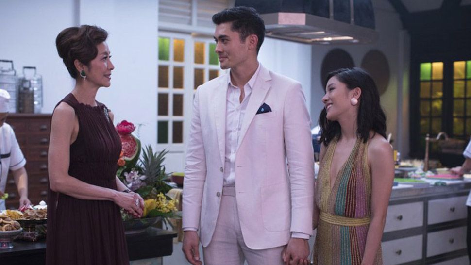 Michelle Yeoh, Henry Golding and Constance Wu in a scene from "Crazy Rich Asians." (Warner Bros.) 