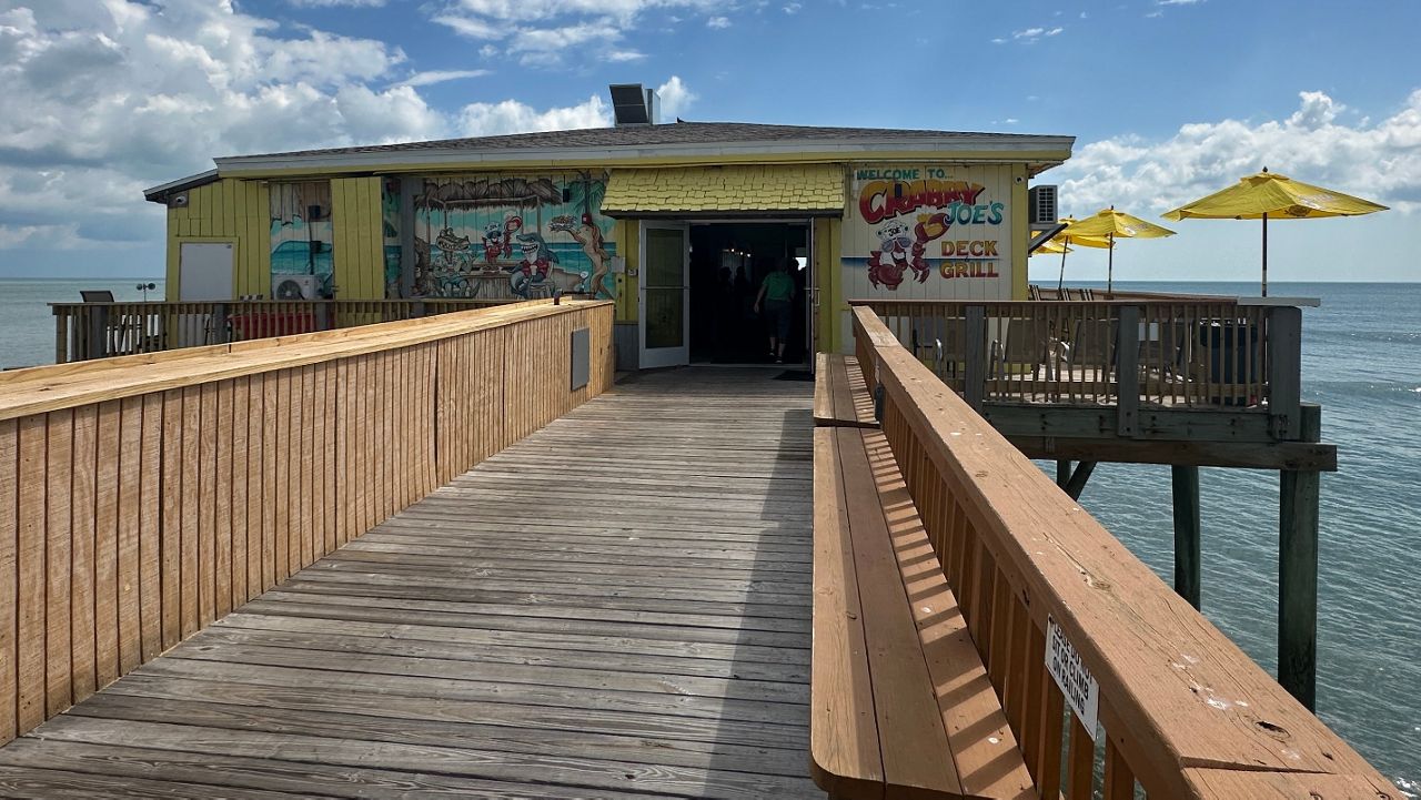 Storm damage from Hurricane Ian destroyed about 250 feet of the business pier.