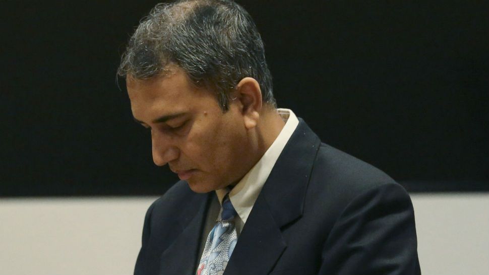 In this Friday, Aug. 17, 2018 photo, Dr. Shafeeq Sheikh awaits his sentencing at Harris County Family Law Center in Houston. The former Baylor doctor received 10 years probation for raping a patient in 2013 at Ben Taub Hospital. (Yi-Chin Lee/Houston Chronicle via AP)