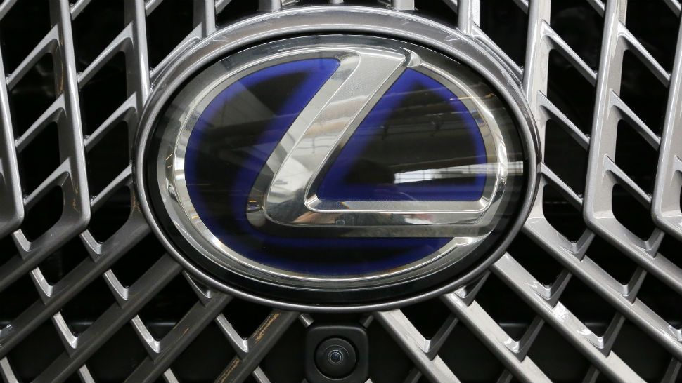 This is the Lexus logo on the grill of a LS 500h automobile on display at the Pittsburgh Auto Show Thursday, Feb. 15, 2018. (AP Photo/Gene J. Puskar)