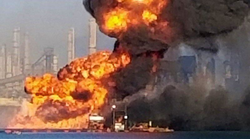 Coast Guard crews respond to a dredge on fire in the Port of Corpus Christi Ship Channel, Friday, Aug. 21, 2020, in Corpus Christi, Texas. (U.S. Coast Guard via AP)