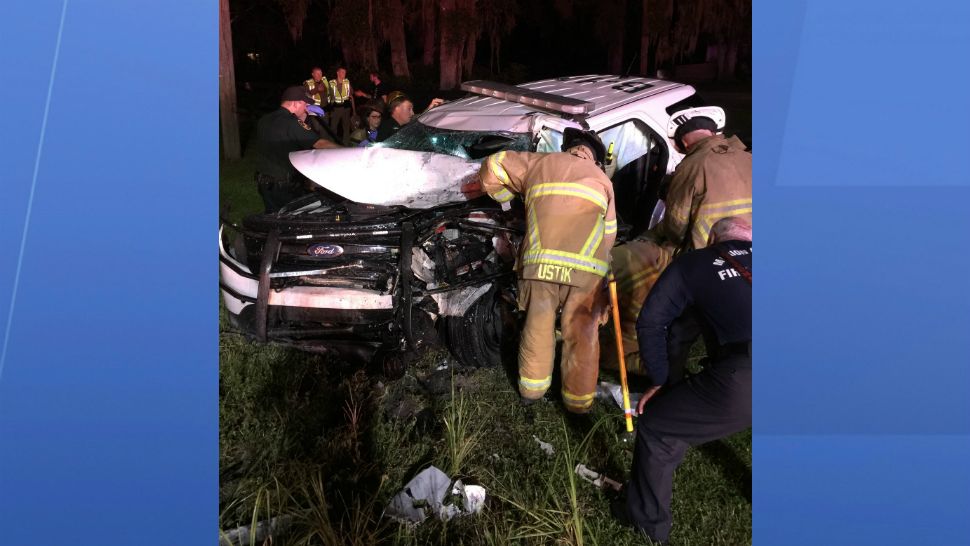 First responders work the scene of a head-on crash involving a Marion County deputy late Wednesday night. The deputy was hospitalized with several broken bones. (Marion County Sheriff's Office Facebook page)