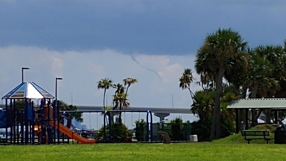 Sent to us via the Spectrum News app: A funnel cloud or water spout spotted in the Titusville area Friday. (Randal Wieder, Viewer)