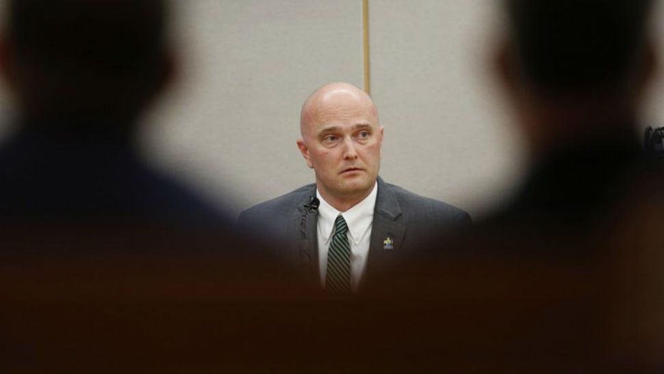 Fired Balch Springs police officer Roy Oliver, who is charged with the murder of 15-year-old Jordan Edwards, testifies with defense attorney Jim Lane during the sixth day of his trial at the Frank Crowley Courts Building in Dallas on Thursday, Aug. 23, 2018. (Rose Baca/The Dallas Morning News via AP, Pool)