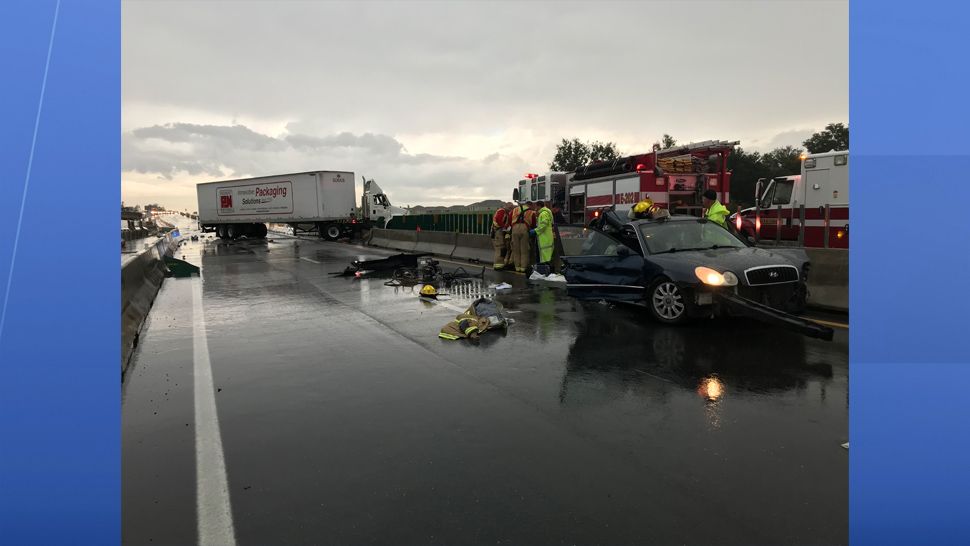 The Florida Highway Patrol is investigating a multiple-vehicle crash in the southbound lanes of I-75 after a Hyundai Sonata drove through standing water, spun out, and caused a chain of crashes. (FHP)