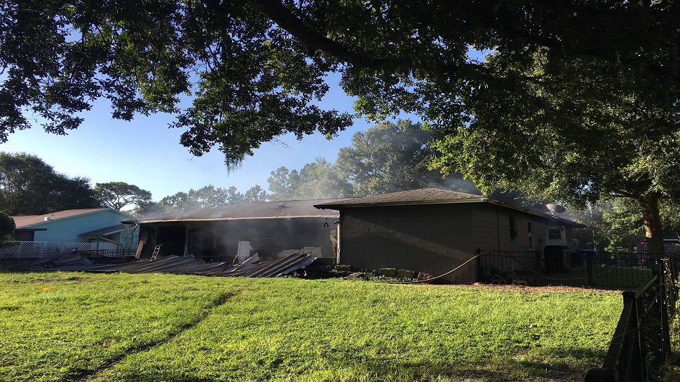 Pasco Fire Rescue responded to a home in the 23500 block of Turtle Lakes Lane just before 8 a.m. where they found heavy smoke and fire coming from the single-story home. (Pasco County Fire Rescue)