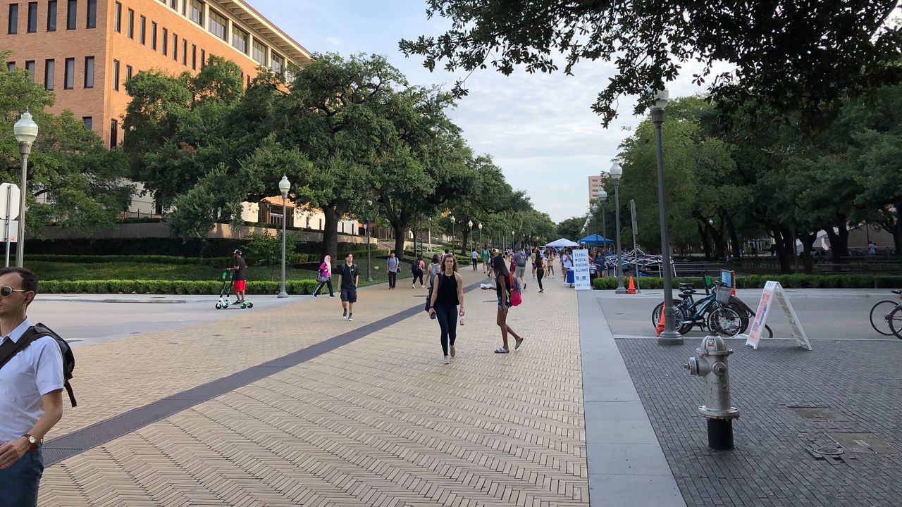 People walking on Speedway at the UT Austin campus on August 28, 2019 (Spectrum News)