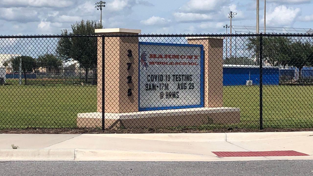 Harmony Middle School will move to only virtual classes for the next two weeks. Drive-thru COVID-19 testing will be available for free Saturday. (Stephanie Bechara, Spectrum News)