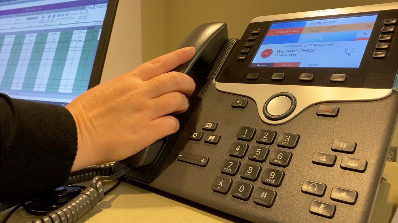 The phone is ringing less at the Wake County EOC's COVID-19 Call Center.