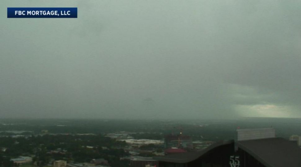 Heavy rain drenches the west Orlando metro area as severe thunderstorm warnings were in effect for parts of Orange County. (Sky 13 downtown camera)