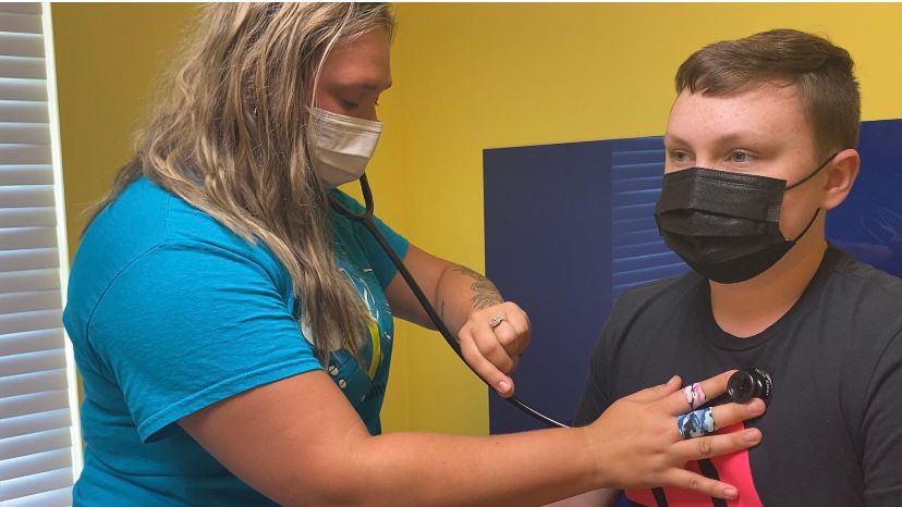 Madison Rabourn, a medical assistant at Oldham County Pediatrics taking a patients vital signs.