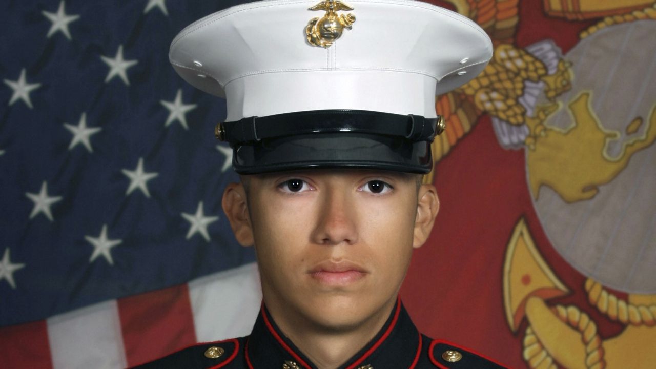 This undated photo released by the 1st Marine Division, Camp Pendleton/U.S. Marines shows Marine Corps Cpl. Hunter Lopez, 22, of Indio, Calif. (U.S. Marines via AP)