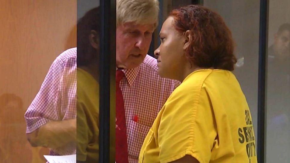 Michelle Shockley makes a 1st appearance before a judge Friday after her arrest on attempted carjacking charges. (Spectrum News 13)