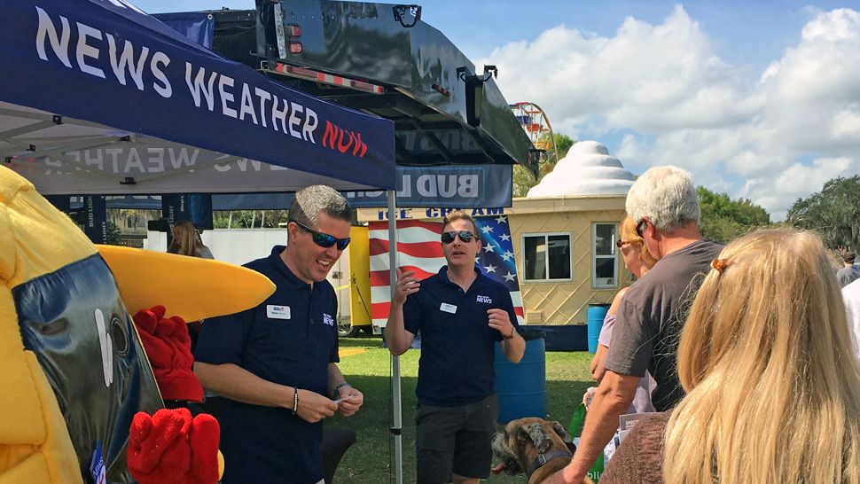 Spectrum News 13 joined 23,000 attendees at the Pig on the Pond festival in Clermont benefitting Project Scholars in March of 2019. Chief Meteorologist Bryan Karrick, meteorologists Chris Gilson, Maureen McCann, and Mallory Nicholls, anchors Eric Levy and Ybeth Bruzual as well as Lake County reporter Dave DeJohn greeted families and festival goers and handed out Spectrum News 13 car phone chargers and Project Weather Activity Books. 