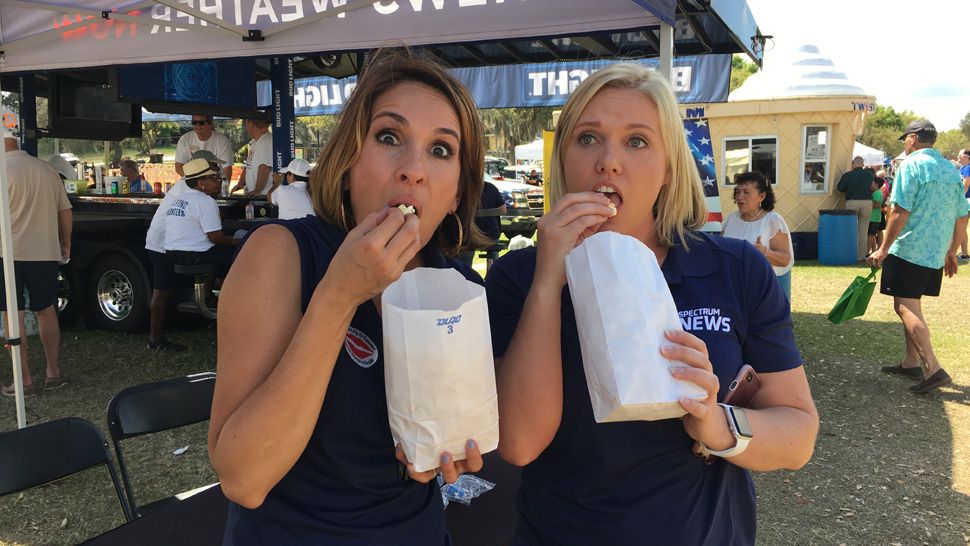 Spectrum News 13 joined 23,000 attendees at the Pig on the Pond festival in Clermont benefitting Project Scholars in March of 2019. Meteorologist Mallory Nicholls and anchor Ybeth Bruzual, enjoying a little snack, were just some of the news team who greeted families and festival goers and handed out Spectrum News 13 car phone chargers and Project Weather Activity Books.