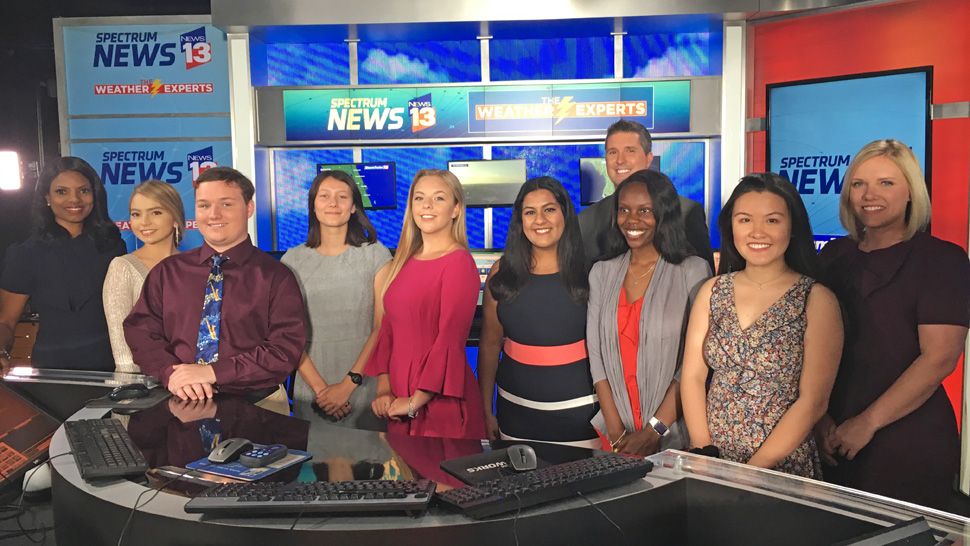 Left to right: Sofia Pintado, Nicholas Smith, Elizabeth Pruitt, Jenni Reed, Ann-Marie Derias, Latoria Brown, and Tran Le with News 13 Chief Meteorologist Bryan Karrick in the back and News 13 Meteorologist Mallory Nicholls on far right. Far left, Tammie Fields also helped present the awards.