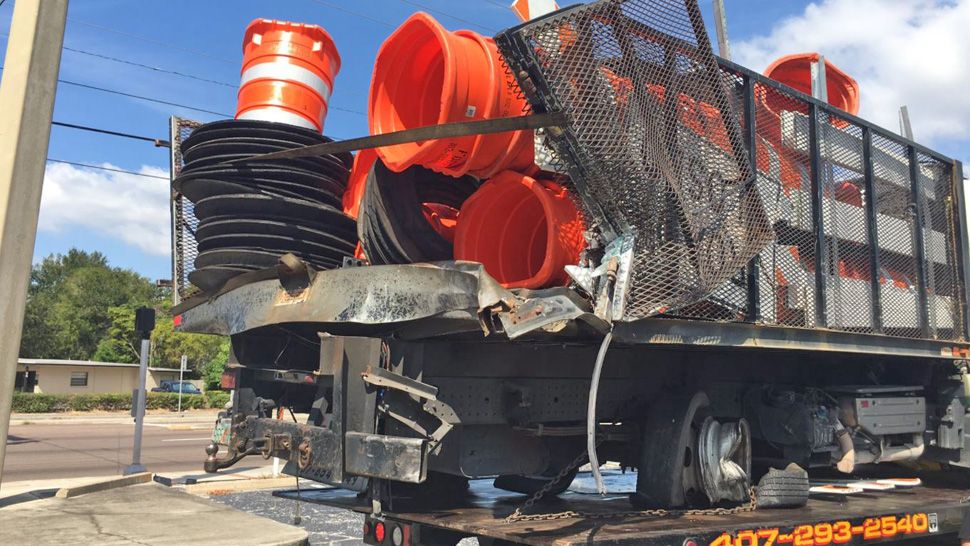 This is the construction truck that Florida Highway Patrol Trooper Tracy Vickers' patrol car collided with on State Road 408 on Friday, September 27, 2019. (Asher Wildman/Spectrum News 13)
